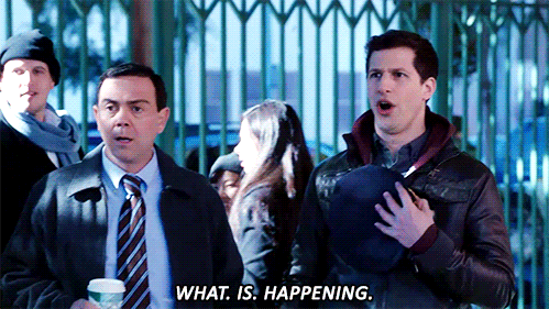 GIF of Jake (Andy Samberg) on Brooklyn 99 saying "What. Is. Happening."